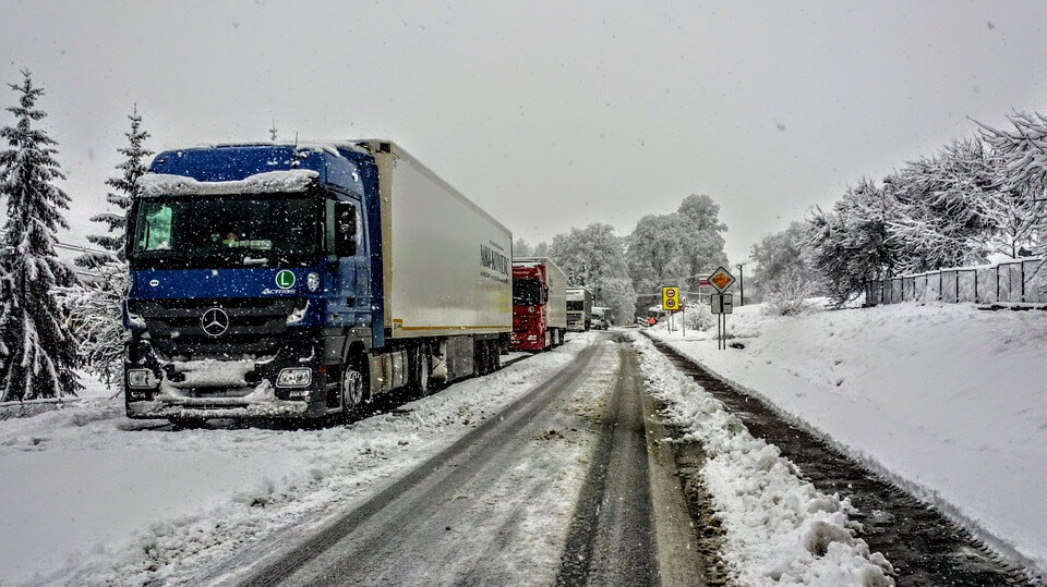 Lorries battle through icy roads