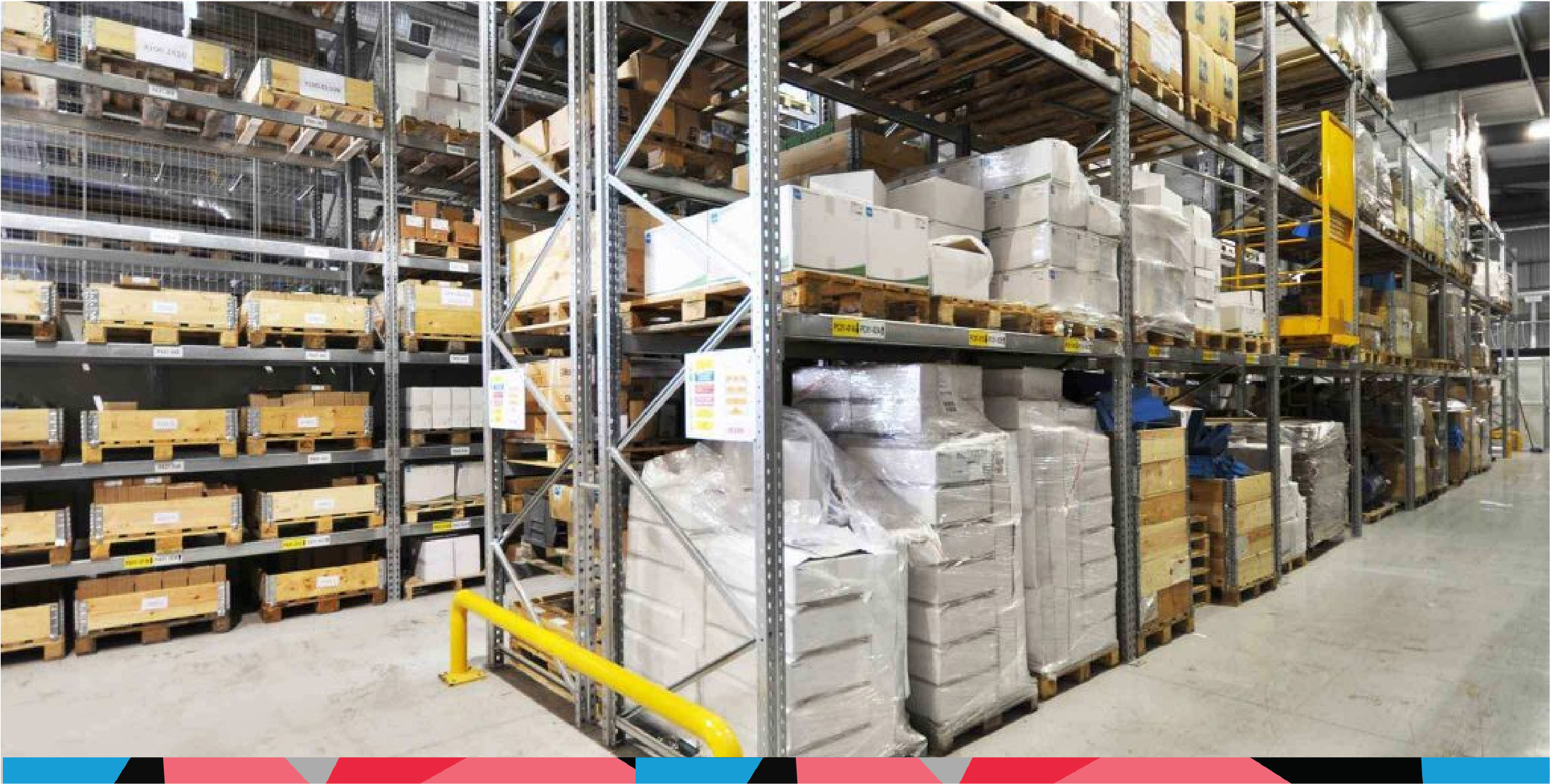 adjustable pallet racking installation within a warehouse complete with weight loading signs