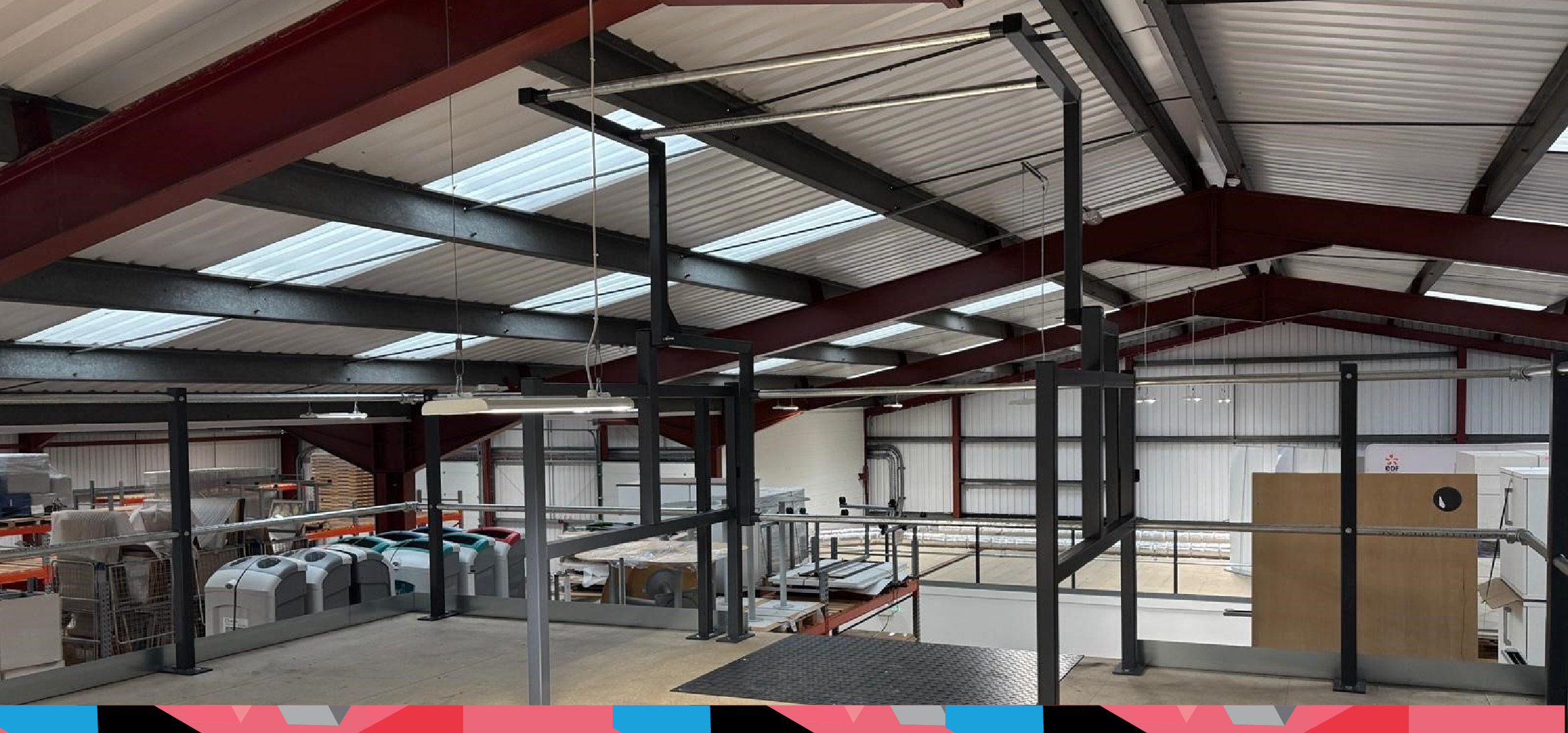 Top level of a mezzanine project with a pallet loading gate positioned to assist with workflow