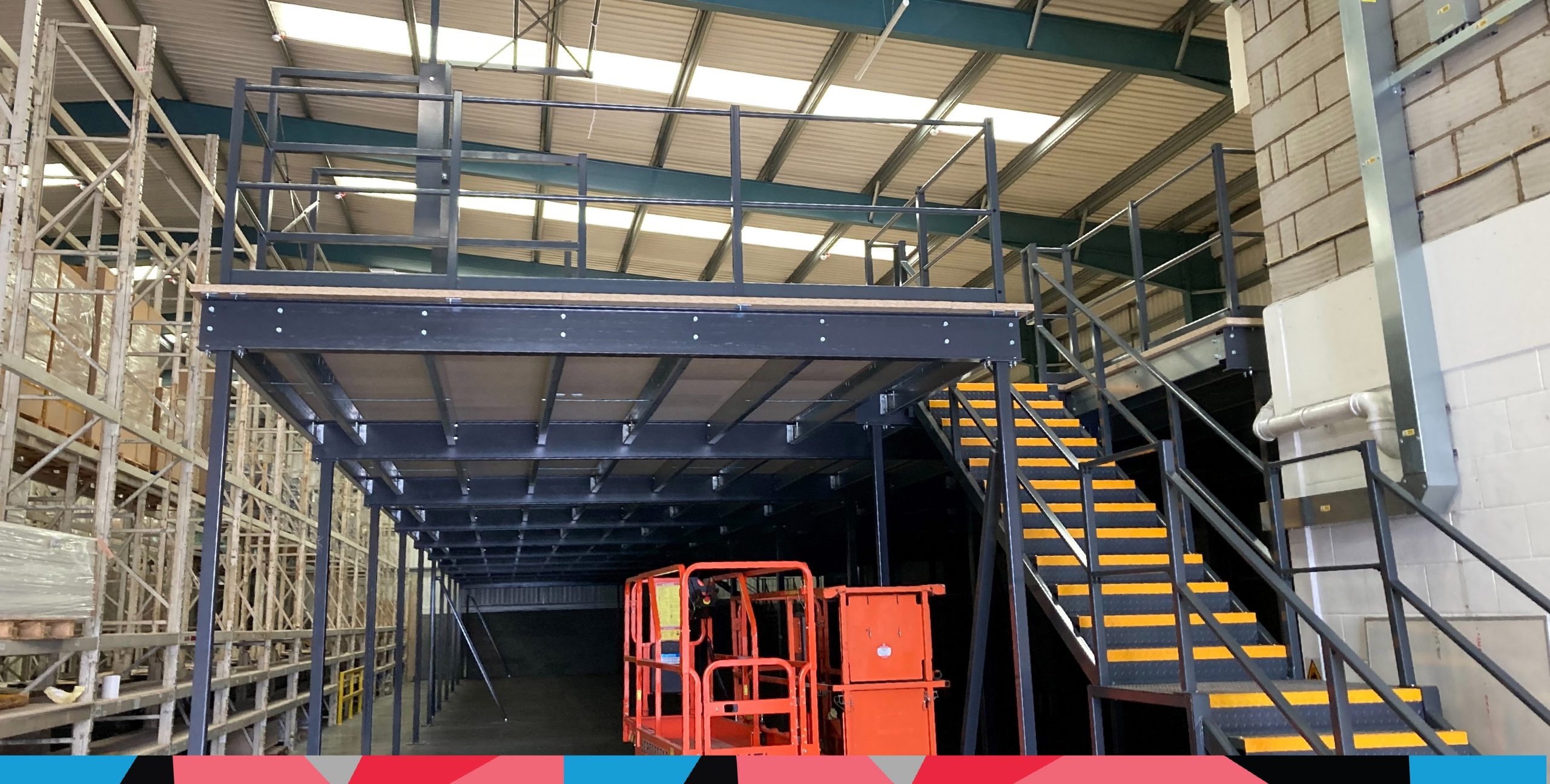 Warehosue mezzanine floor complete with staircase and railings