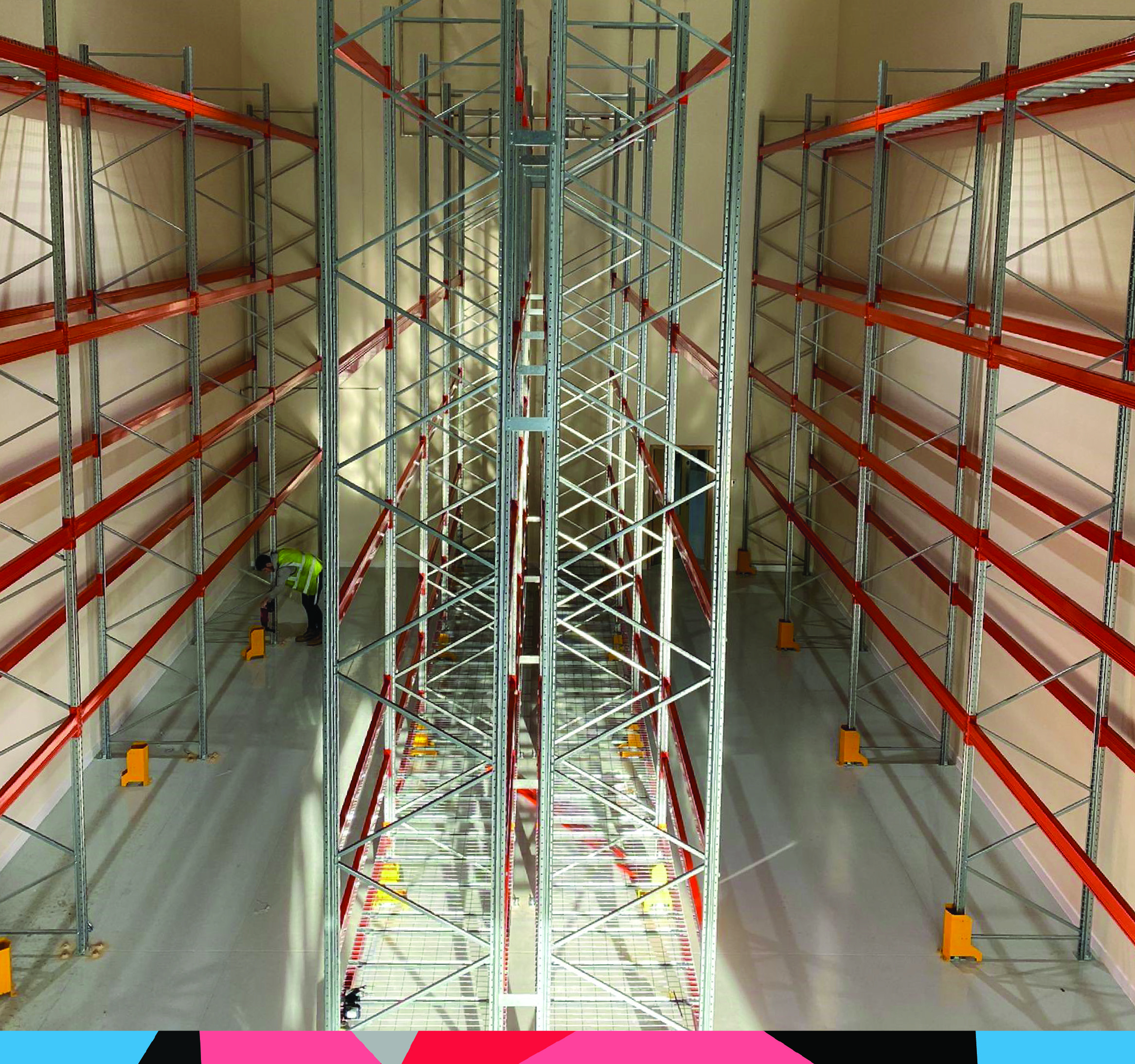 Warehouse with narrow aisle pallet racking installation from a high view