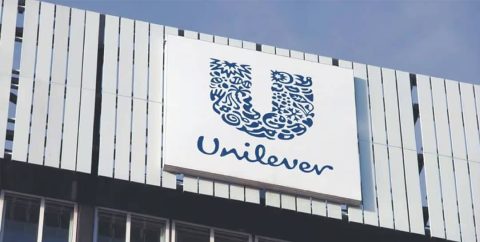 Warehouse exterior with the Unilever logo displayed on the building.