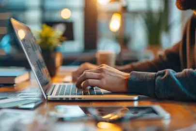 Office Interior Designer working at laptop.