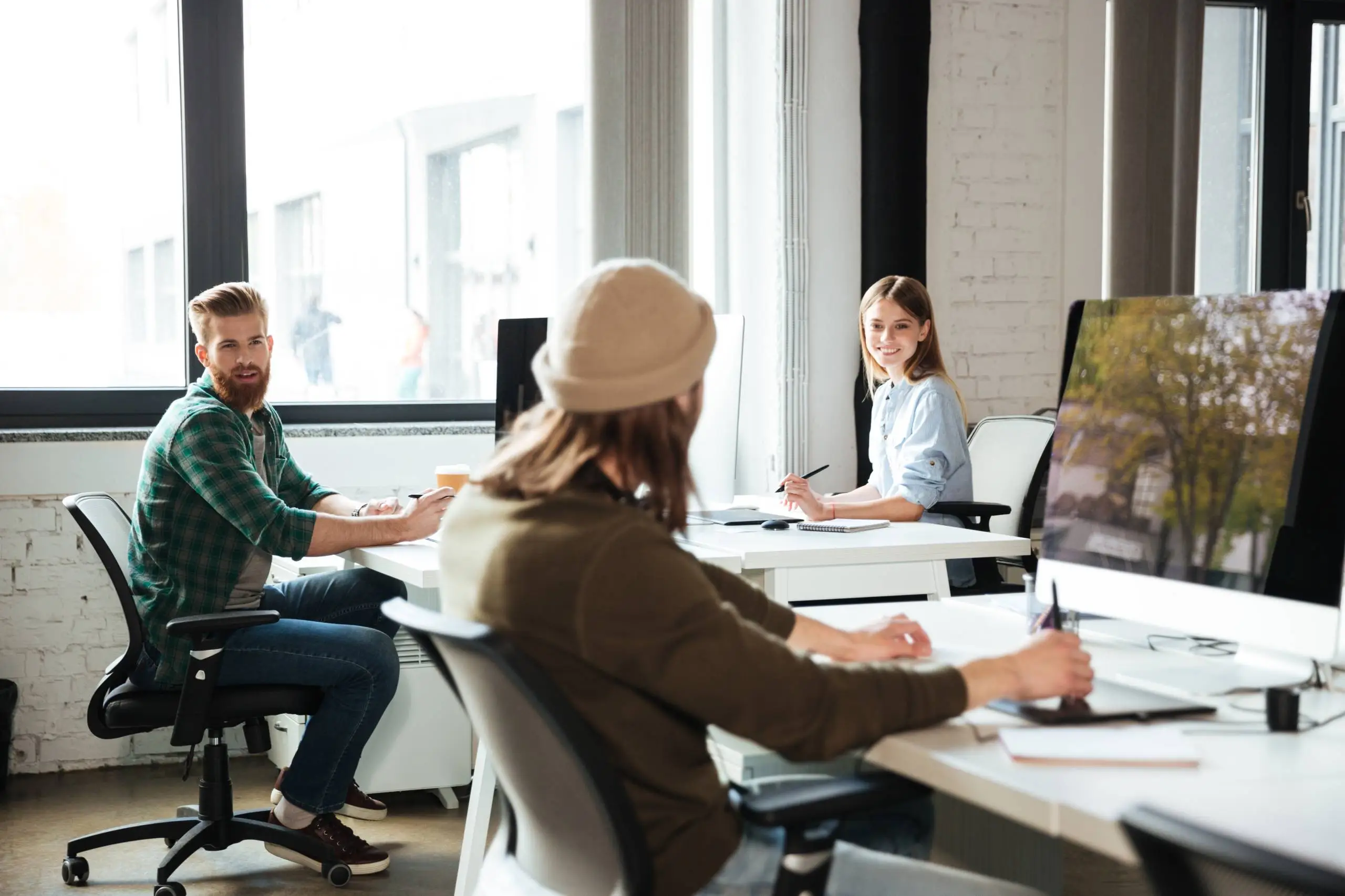 team members at office desks